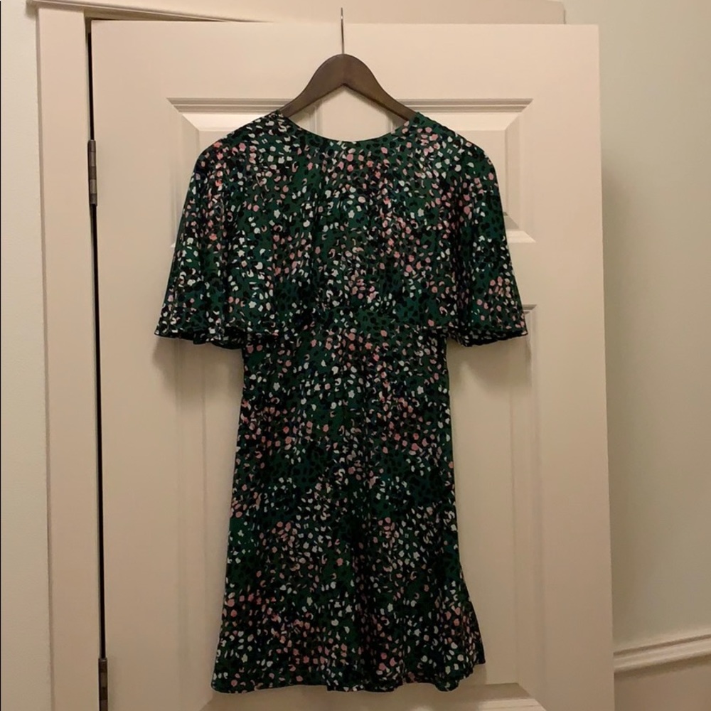 Cheetah printed green dress!! Shows curves!!